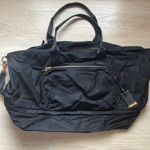 Tumi expandable black travel tote